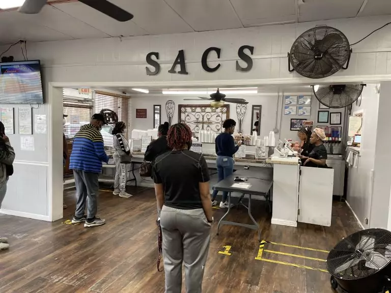 Students work in a school kitchen classroom.