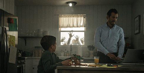 father and son in kitchen