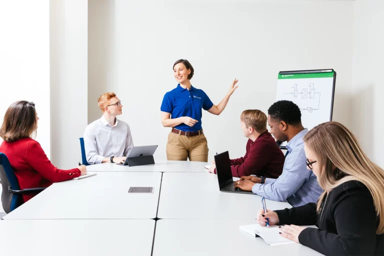 TVA employee presenting to group in an office conference room