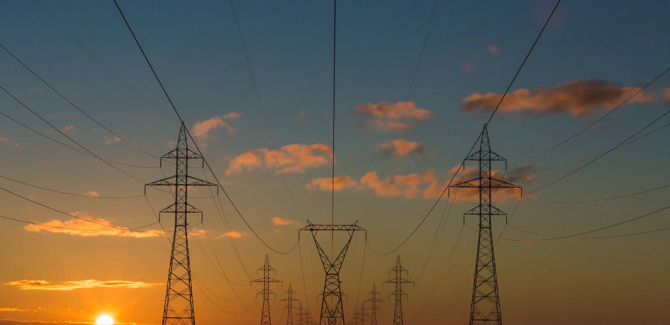 transmission lines at sunset