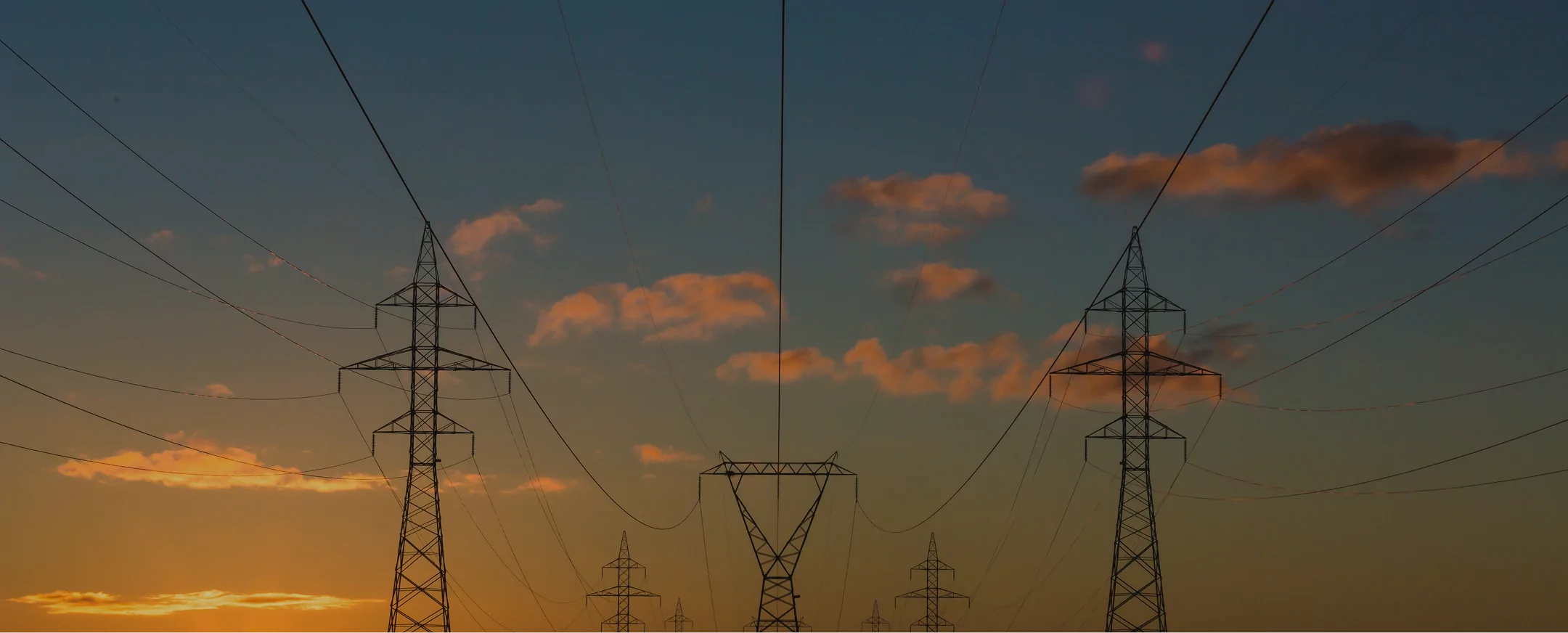 Transmission lines at sunset.