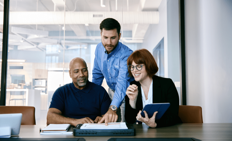 Professional discussing renewables in an office setting.