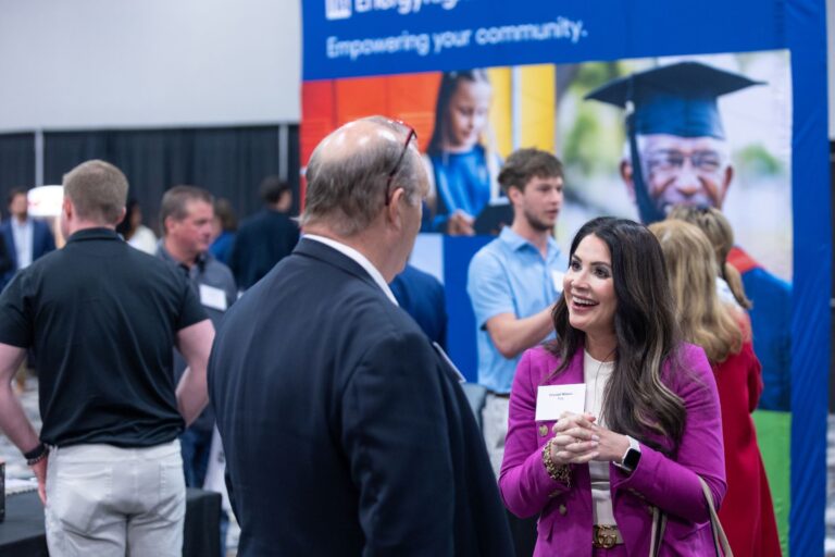 Colleagues connecting at the 2025 summit