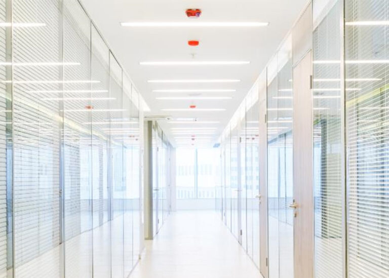 A brightly LED-lit hallway at TriStar Greenview